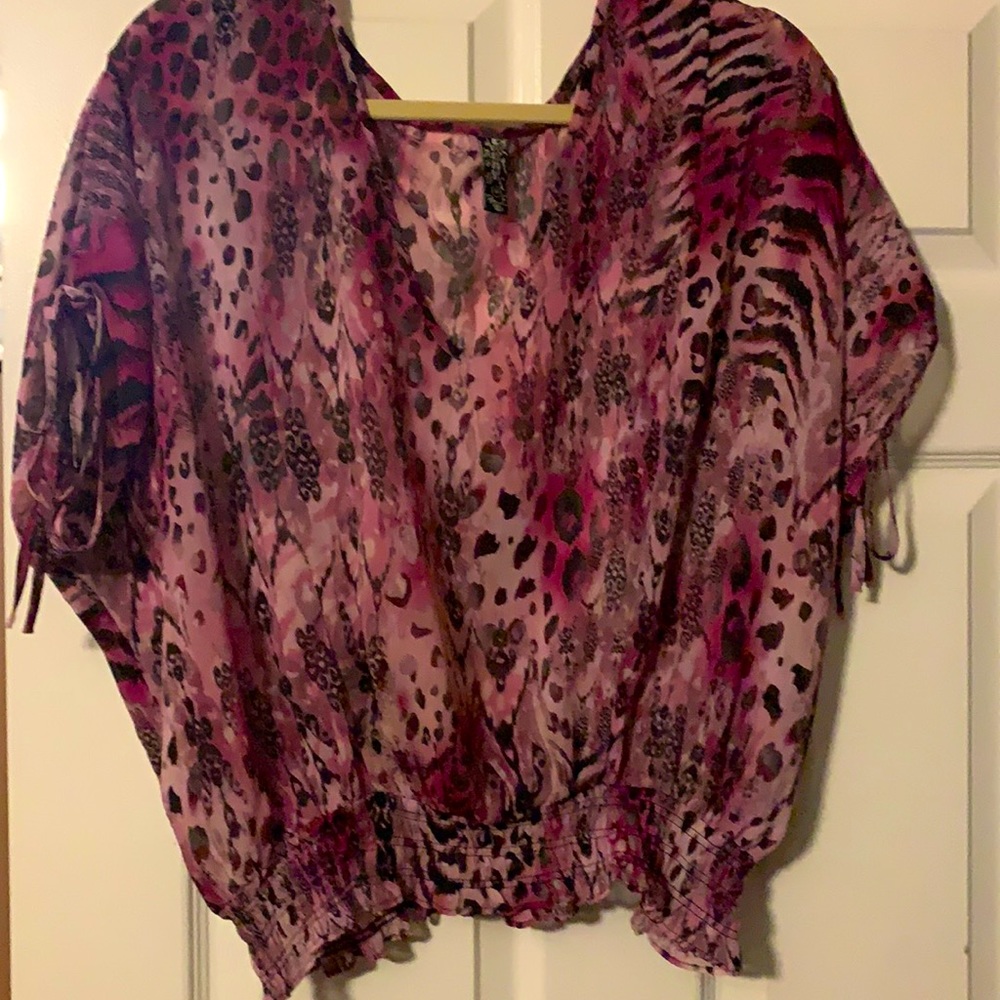 Very pretty sheer top.